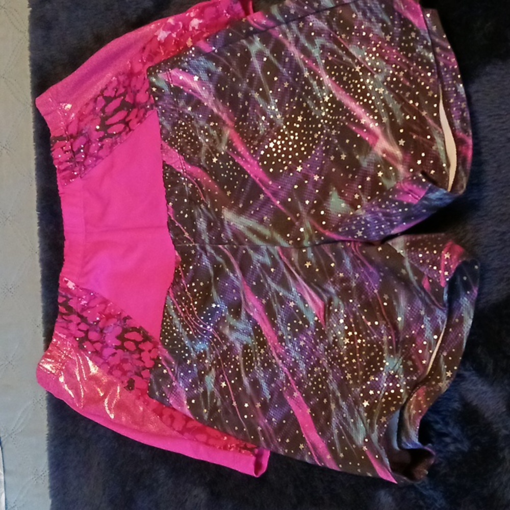 Girl's dance shorts by Danskins, size L(10-12). (1) hot pink (1) black multi.